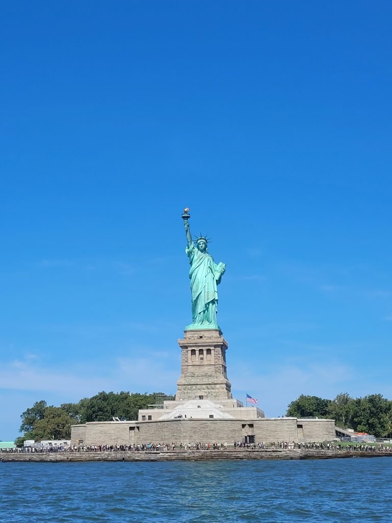 Front view of The Statue of Liberty from ferry. 